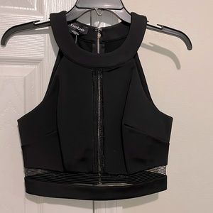 Black crop top size xs with tags still on never used